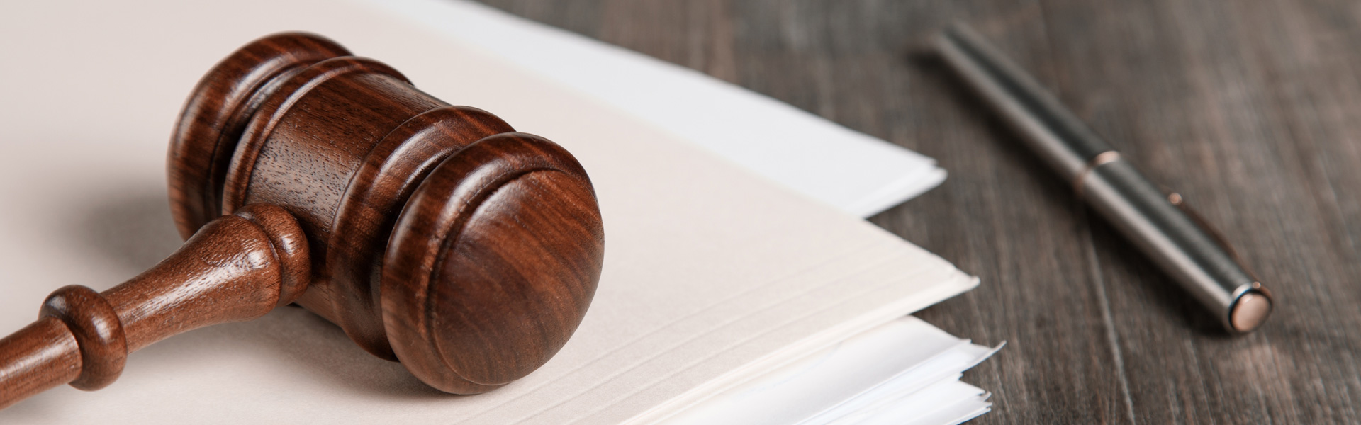 Gavel And Paper With Pen